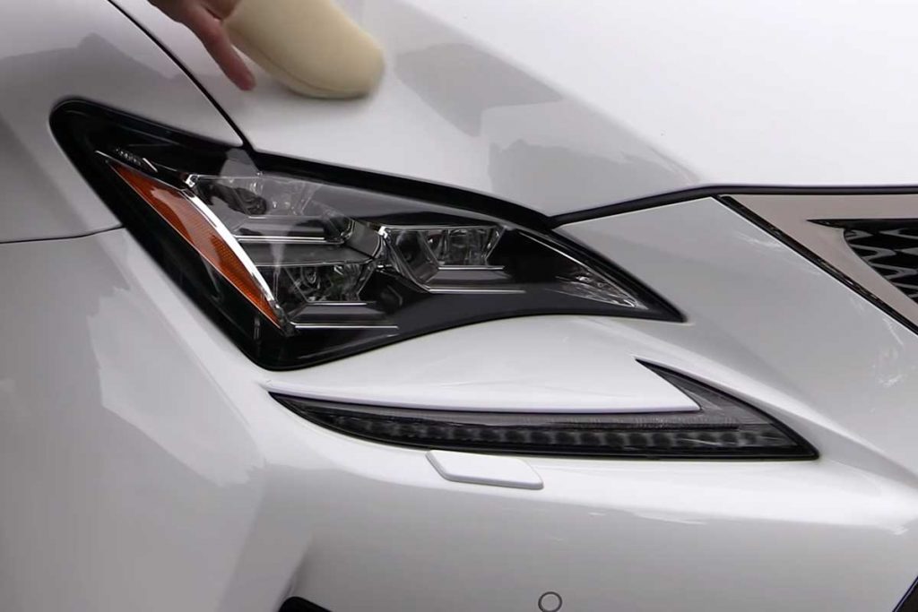 Apply a Carnauba based Wax with a soft foam applicator